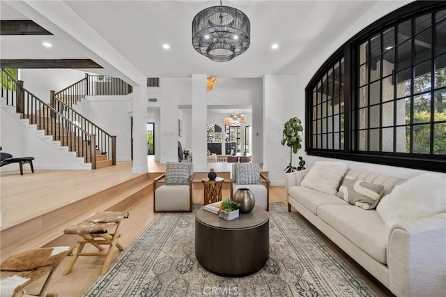 115 Buckskin Rd, Bell Canyon, CA 91307 - living room featuring a chandelier, stairs, wood finished floors, baseboards, and recessed lighting