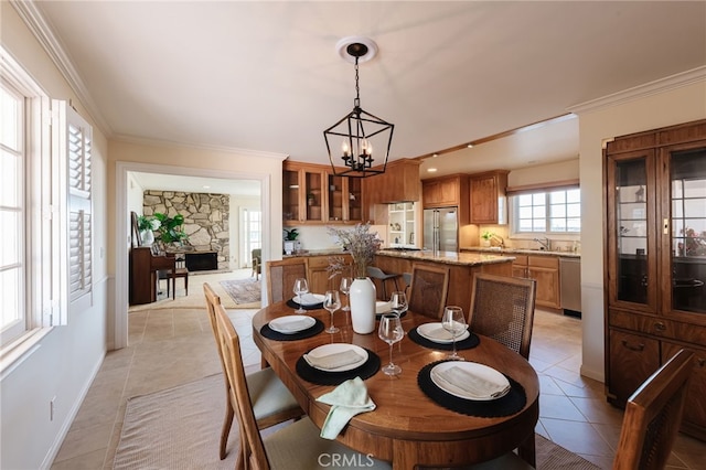 6528 Abbottswood Dr, Rancho Palos Verdes, CA 90275 - dining room with ornamental molding, baseboards, an inviting chandelier, and light tile patterned flooring