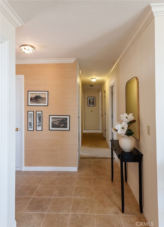 6528 Abbottswood Dr, Rancho Palos Verdes, CA 90275 - hallway with light tile patterned floors, a textured ceiling, and crown molding