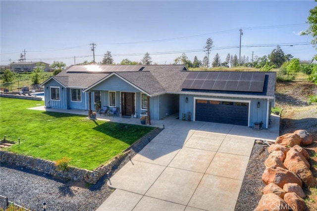 ranch-style home with a porch, a garage, board and batten siding, and driveway