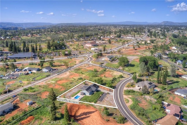 birds eye view of property with a residential view