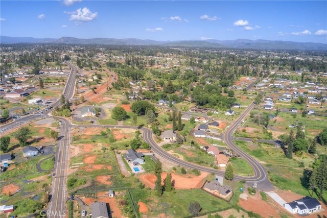 bird's eye view with a mountain view
