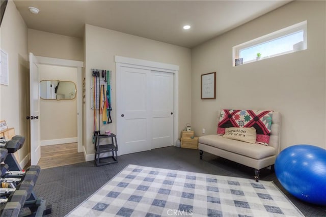 interior space with carpet floors, baseboards, and recessed lighting