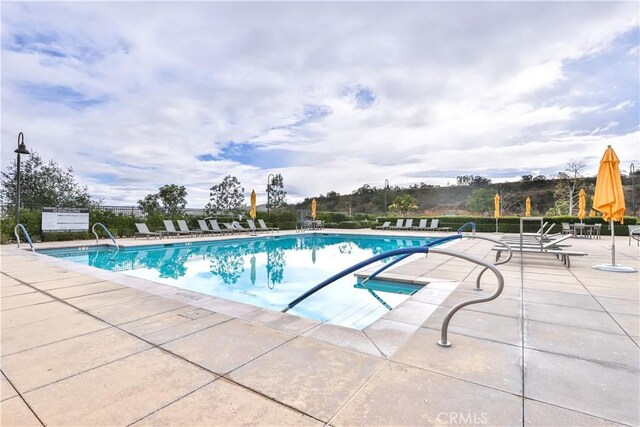 pool featuring a patio area