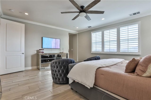 bedroom featuring crown molding and visible vents