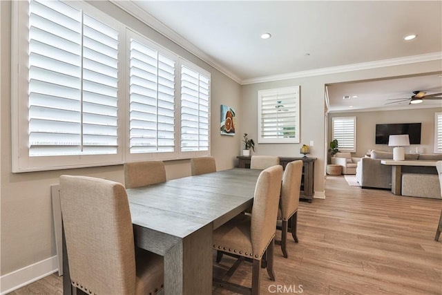 2454 Nova Way, Corona, CA 92883 - dining area with wood finished floors, ornamental molding, recessed lighting, ceiling fan, and baseboards