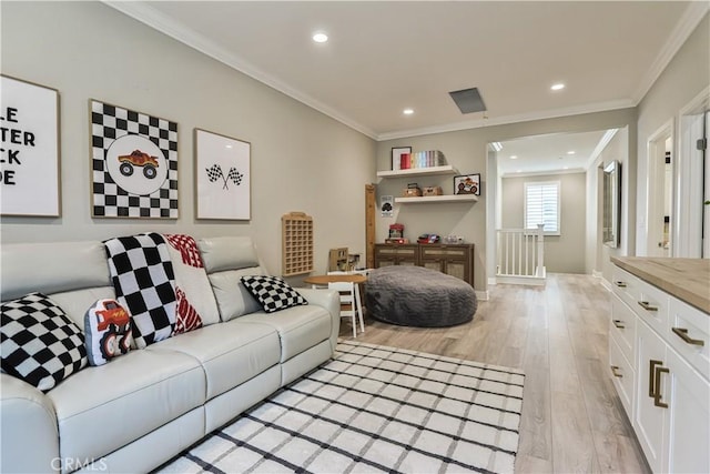 living area with light wood-type flooring, recessed lighting, baseboards, and crown molding