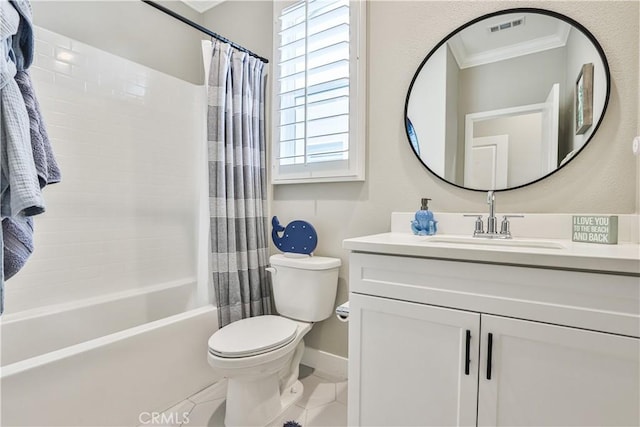 bathroom featuring crown molding, visible vents, vanity, toilet, and tile patterned floors