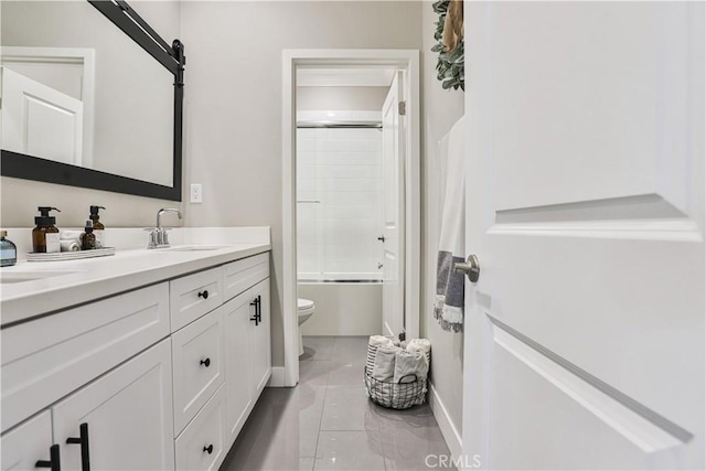 2454 Nova Way, Corona, CA 92883 - bathroom with toilet, double vanity, tile patterned floors, shower / bath combination, and baseboards