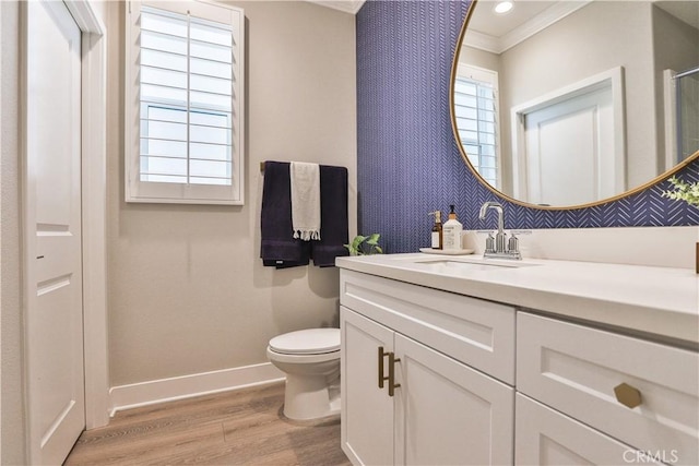 2454 Nova Way, Corona, CA 92883 - full bath featuring ornamental molding, wood finished floors, baseboards, toilet, and vanity