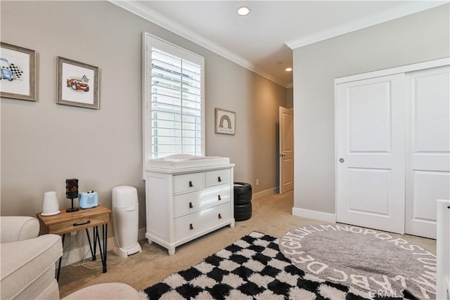 bedroom with light colored carpet, crown molding, baseboards, a closet, and recessed lighting