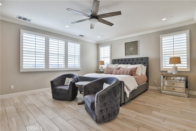 bedroom with visible vents, ornamental molding, light wood-style floors, and recessed lighting