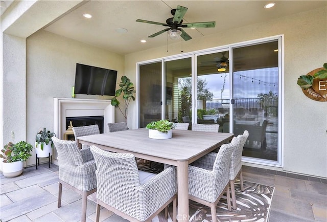 2454 Nova Way, Corona, CA 92883 - view of patio / terrace featuring a ceiling fan, an outdoor fireplace, and outdoor dining space
