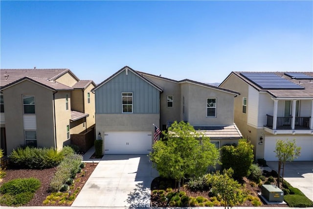 2454 Nova Way, Corona, CA 92883 - traditional home with concrete driveway, a garage, board and batten siding, and stucco siding