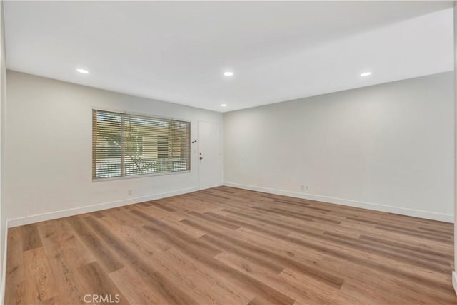 444 Obispo Ave Unit 201, Long Beach, CA 90814 - unfurnished room featuring recessed lighting, light wood finished floors, and baseboards