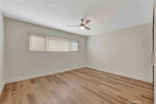 444 Obispo Ave Unit 201, Long Beach, CA 90814 - empty room with ceiling fan, light wood-type flooring, and baseboards
