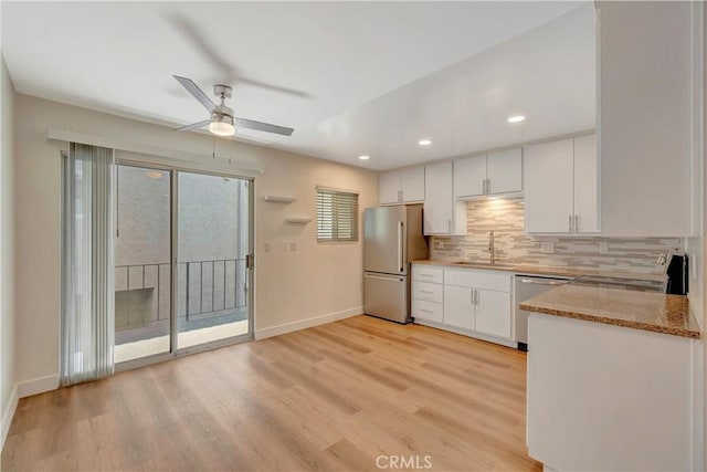 444 Obispo Ave Unit 201, Long Beach, CA 90814 - kitchen with appliances with stainless steel finishes, a sink, ceiling fan, baseboards, and recessed lighting