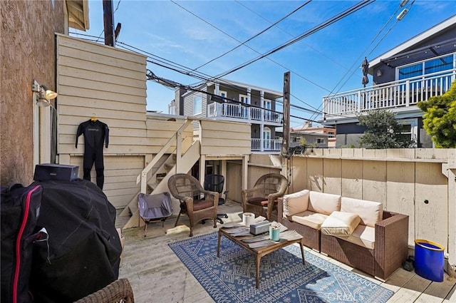 view of patio with grilling area, a deck, and outdoor lounge area