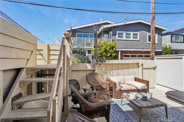 view of patio / terrace with an outdoor hangout area and fence