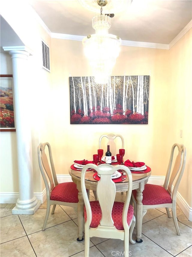 tiled dining area with an inviting chandelier, visible vents, decorative columns, and ornamental molding