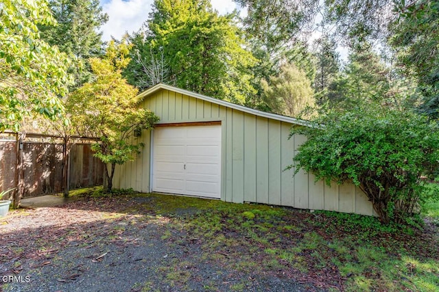 garage with fence