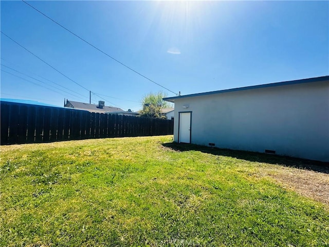 view of yard featuring fence