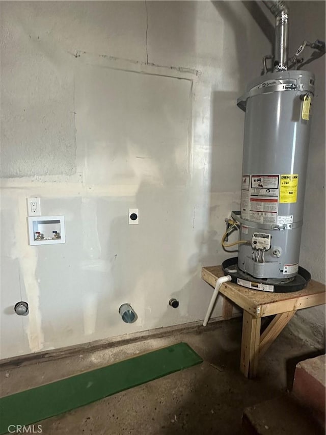 utility room with strapped water heater