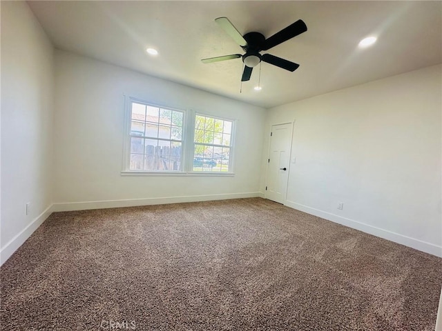 unfurnished room featuring carpet floors, baseboards, a ceiling fan, and recessed lighting