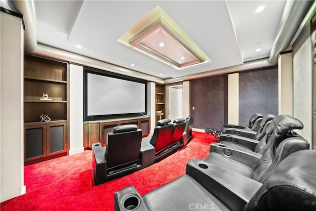 9 Shoreridge, Newport Coast, CA 92657 - home theater room featuring a tray ceiling, built in features, carpet flooring, and recessed lighting