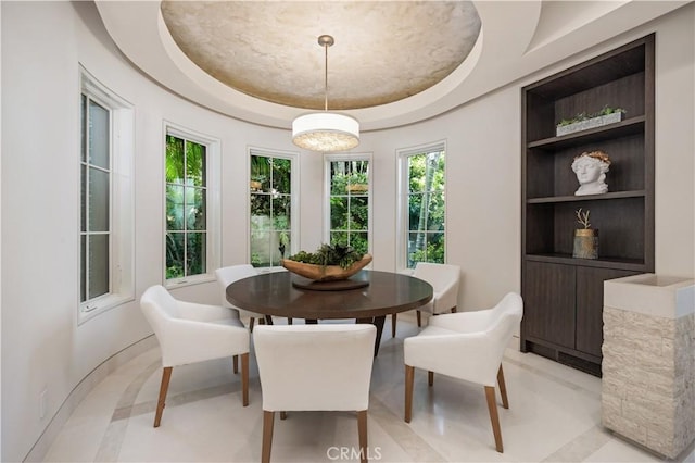 9 Shoreridge, Newport Coast, CA 92657 - dining area featuring built in shelves and a raised ceiling