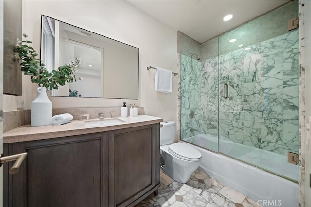 9 Shoreridge, Newport Coast, CA 92657 - bathroom featuring bath / shower combo with glass door, toilet, recessed lighting, vanity, and marble finish floor