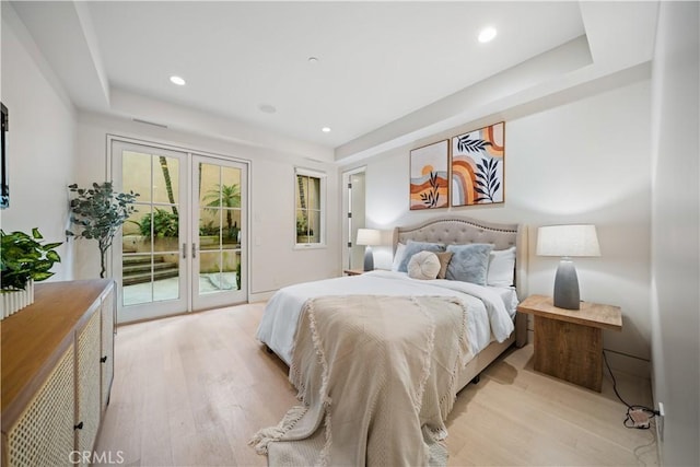 9 Shoreridge, Newport Coast, CA 92657 - bedroom with light wood-style floors, recessed lighting, french doors, and access to exterior