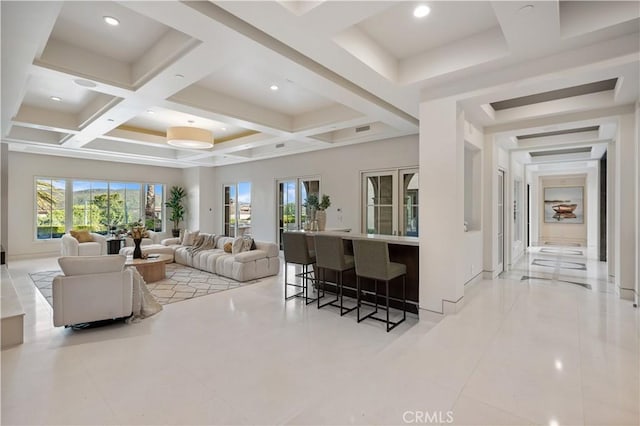 9 Shoreridge, Newport Coast, CA 92657 - living room featuring beam ceiling, baseboards, recessed lighting, and coffered ceiling