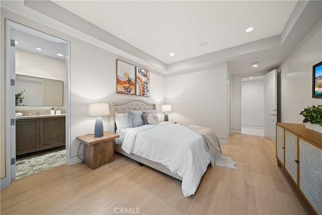 9 Shoreridge, Newport Coast, CA 92657 - bedroom featuring recessed lighting, ensuite bathroom, and light wood-type flooring