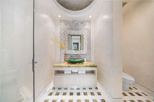 9 Shoreridge, Newport Coast, CA 92657 - bathroom with toilet, vanity, and recessed lighting