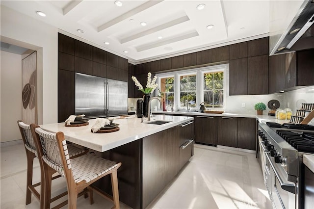 9 Shoreridge, Newport Coast, CA 92657 - kitchen with premium appliances, light countertops, modern cabinets, and a sink
