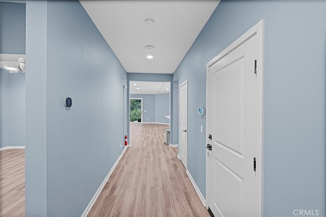 1373 Topanga Dr, San Marcos, CA 92069 - hall with light wood-style floors and baseboards