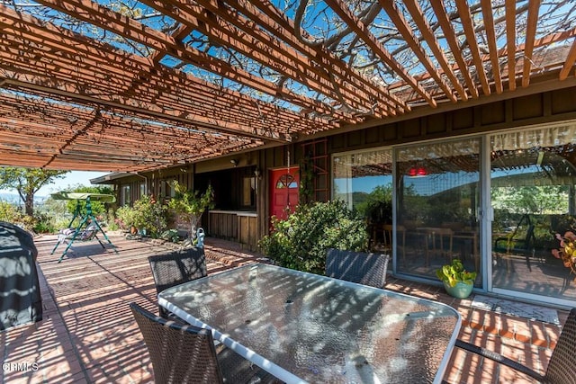view of patio / terrace featuring outdoor dining space and a pergola