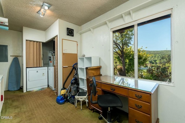carpeted office space with independent washer and dryer, a textured ceiling, and electric panel