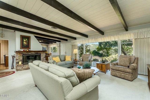 carpeted living room with a fireplace, visible vents, wood ceiling, and vaulted ceiling with beams