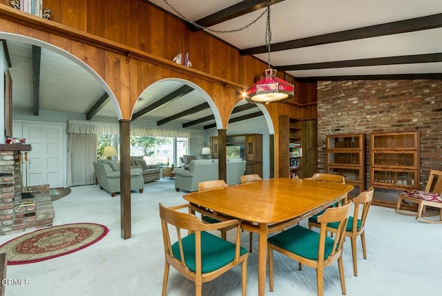 dining room with beam ceiling