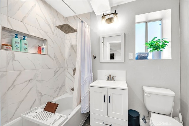 bathroom with shower / bath combo, toilet, and vanity