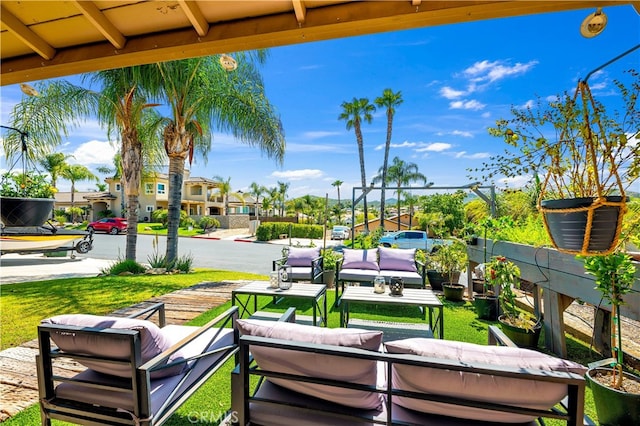 view of patio / terrace with outdoor lounge area and a residential view