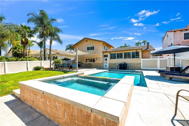 view of pool with a patio, an in-ground hot tub, and cooling unit