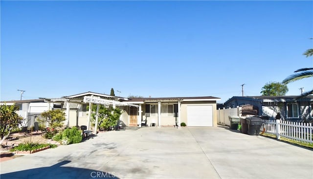 11792 Seacrest Dr, Garden Grove, CA 92840 - ranch-style house featuring a garage, fence, concrete driveway, stucco siding, and a pergola
