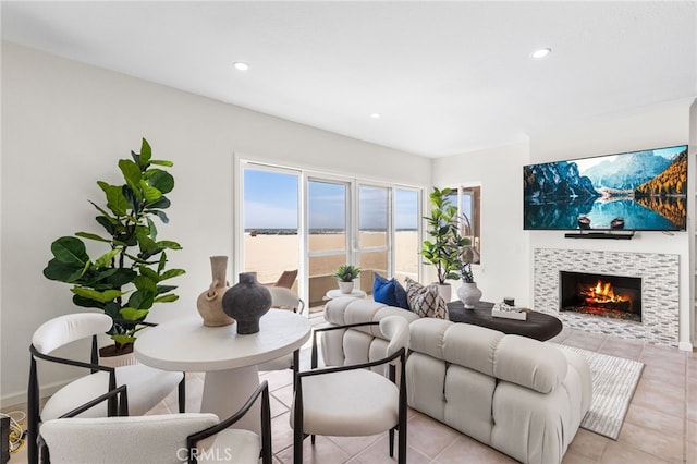 3012 W Oceanfront, Newport Beach, CA 92663 - living room featuring a tiled fireplace, recessed lighting, and light tile patterned floors