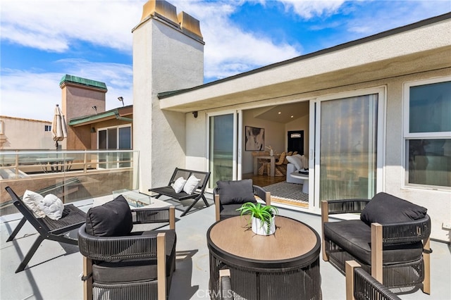 3012 W Oceanfront, Newport Beach, CA 92663 - view of patio / terrace featuring a balcony and an outdoor hangout area