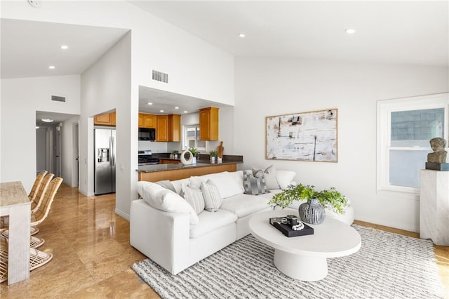 3012 W Oceanfront, Newport Beach, CA 92663 - living area featuring high vaulted ceiling, recessed lighting, and baseboards