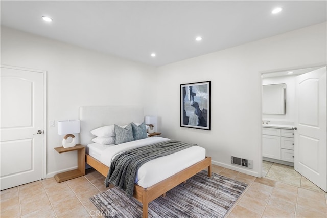 3012 W Oceanfront, Newport Beach, CA 92663 - bedroom with recessed lighting, light tile patterned floors, baseboards, connected bathroom, and a sink