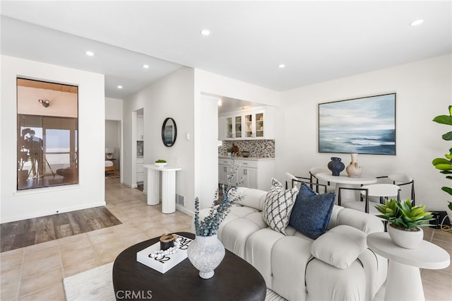 3012 W Oceanfront, Newport Beach, CA 92663 - living area with recessed lighting, baseboards, and light tile patterned floors